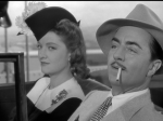 Myrna Loy and William Powell are stopped for speeding.