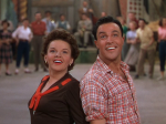 Judy Garland and Gene Kelly smile at the finish of their performance in "Summer Stock."